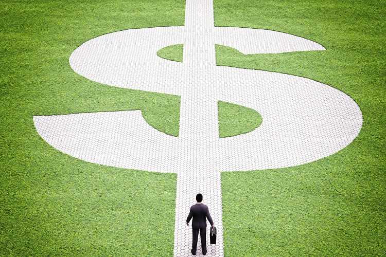 Businessman walks down the financial path