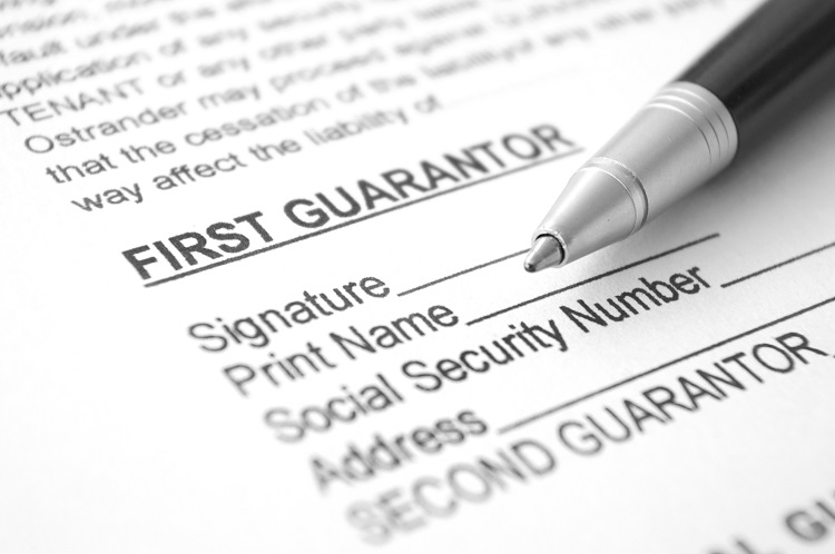 A Guarantor contract waiting to be signed