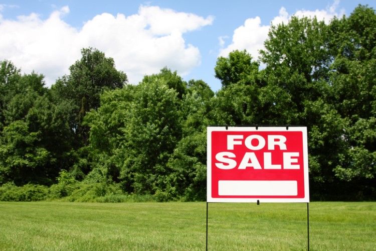 Residential land sales in the first three months of the year set a new record low as demand for homes waned.