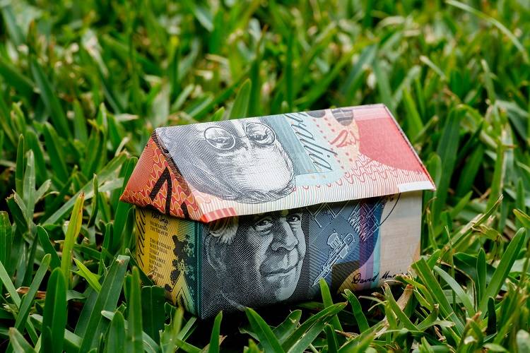 An oragami house made from Australian money