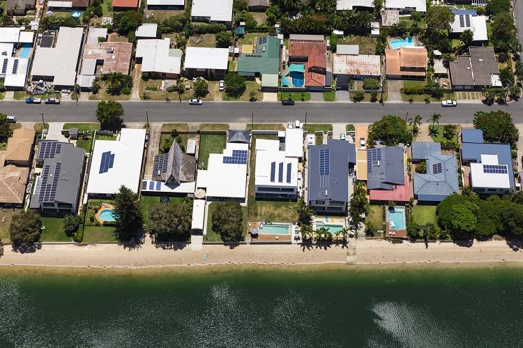 Even if you've moved out of Australia, you may want to purchase a suburban waterfront home